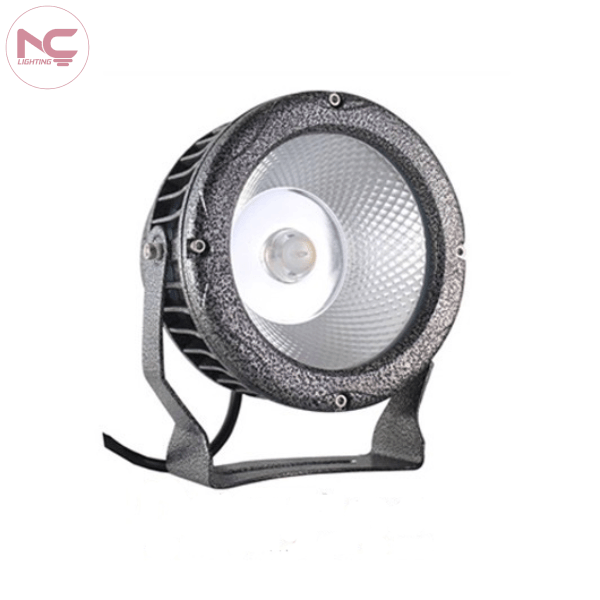 Đèn Rọi Cột Lùn NCRCL dạng tròn màu xám đậm, có tản nhiệt phía sau và đế cố định, chuyên dùng chiếu sáng cột thấp hoặc tiểu cảnh