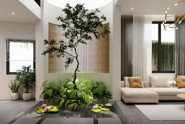 Hệ thống đèn rọi cây trong nhà đang chiếu sáng cây khu vực giếng trời